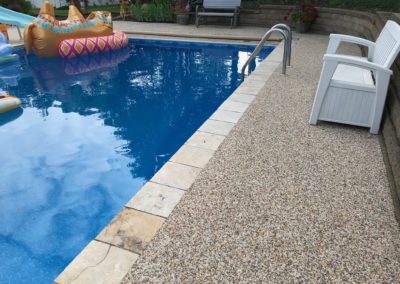 Expert Outdoor Pool Deck with Epoxy Bonded Stone
